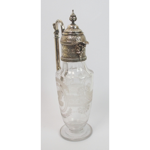 186 - A silver plate mounted claret jug