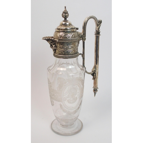 186 - A silver plate mounted claret jug