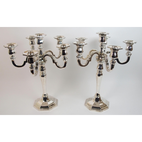 205 - A pair of sterling silver candelabra