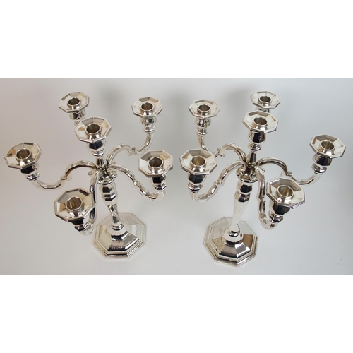 205 - A pair of sterling silver candelabra