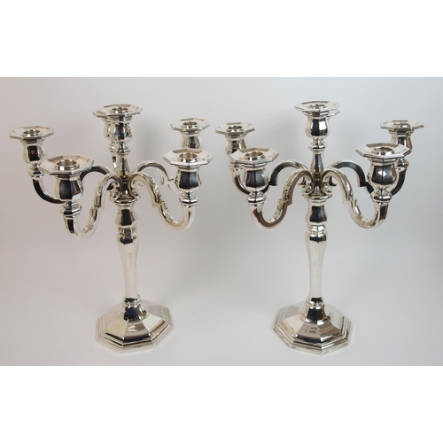 205 - A pair of sterling silver candelabra