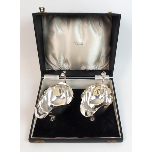 207 - A pair of silver sauceboats