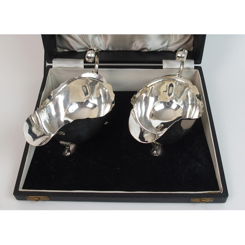 207 - A pair of silver sauceboats