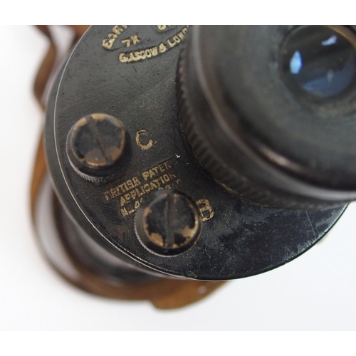 258 - A pair of military issue binoculars