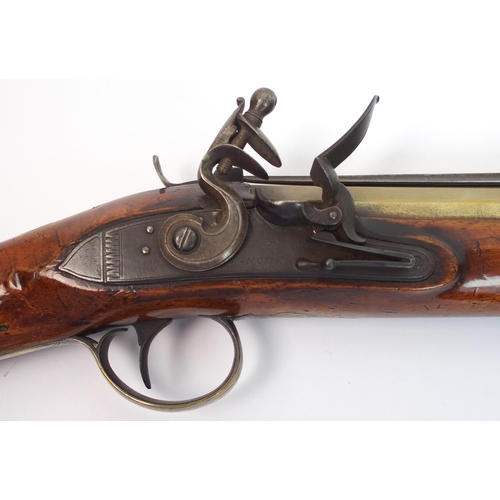 267 - An 18th Century brass barrelled Flintlock blunderbuss with bayonet by H. Nock  London