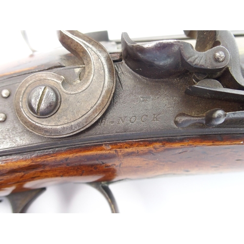 267 - An 18th Century brass barrelled Flintlock blunderbuss with bayonet by H. Nock  London