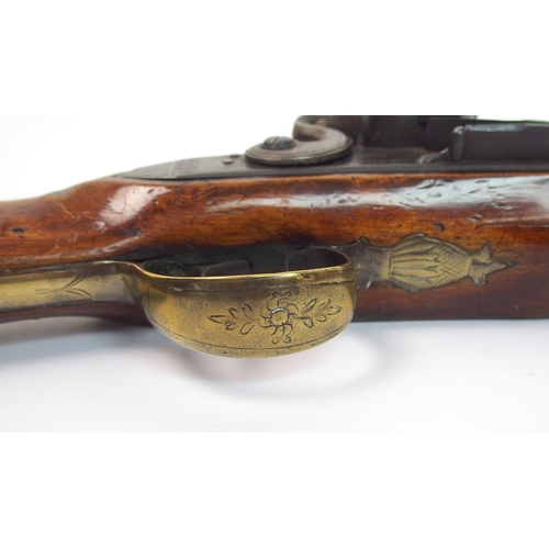 267 - An 18th Century brass barrelled Flintlock blunderbuss with bayonet by H. Nock  London