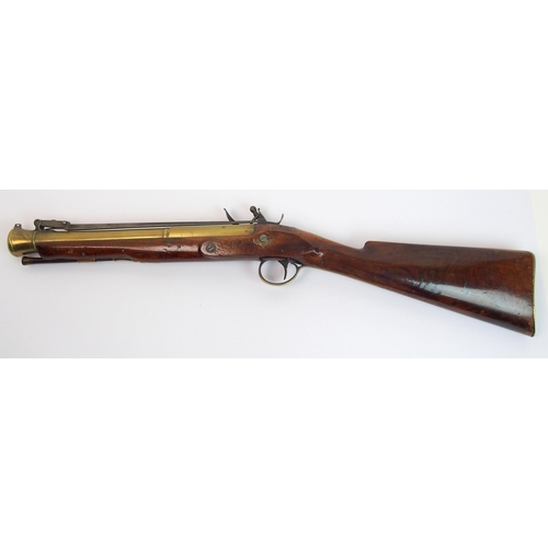 267 - An 18th Century brass barrelled Flintlock blunderbuss with bayonet by H. Nock  London