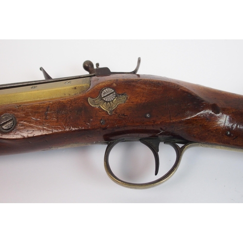 267 - An 18th Century brass barrelled Flintlock blunderbuss with bayonet by H. Nock  London