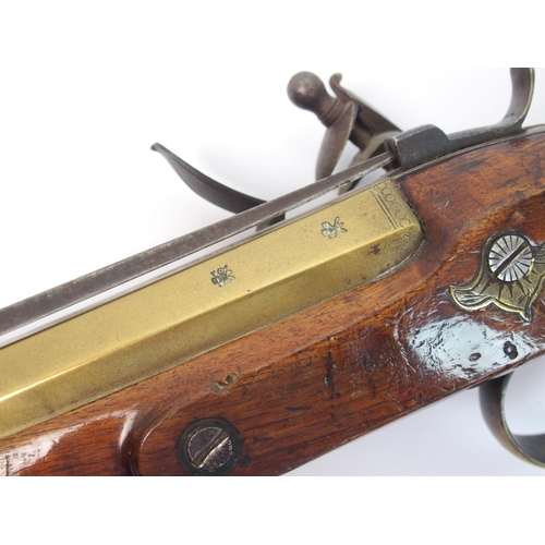 267 - An 18th Century brass barrelled Flintlock blunderbuss with bayonet by H. Nock  London