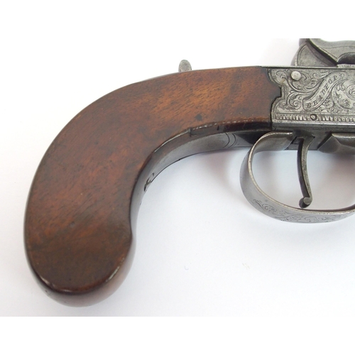 275 - A 19th Century percussion pocket pistol with spring loaded bayonet by W Egan of Bradford