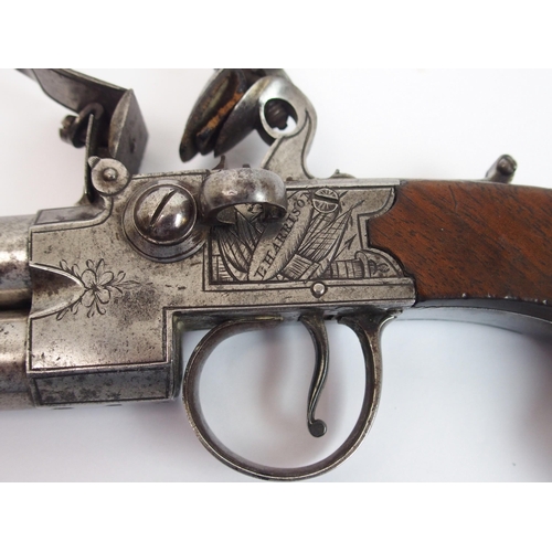 277 - An 18th Century English Flintlock tap-action over-and-under pocket pistol by L Harrison of Carlisle