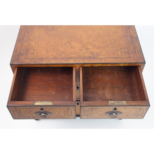 293 - A Victorian walnut and ebony inlaid miniature chest