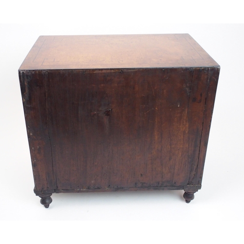 293 - A Victorian walnut and ebony inlaid miniature chest