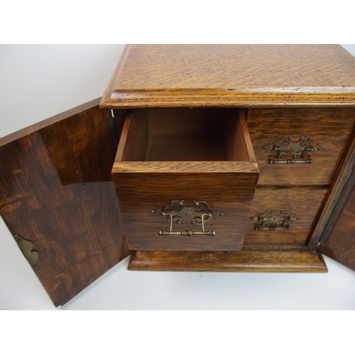 300 - A Victorian stained oak four draw collectors cabinet