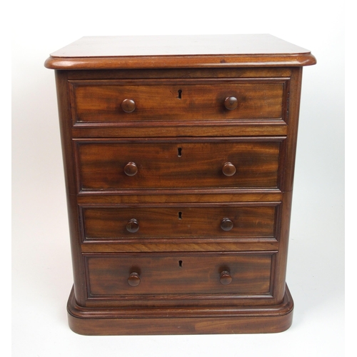 302 - A Victorian mahogany miniature chest