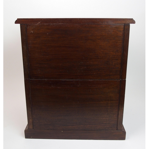 302 - A Victorian mahogany miniature chest