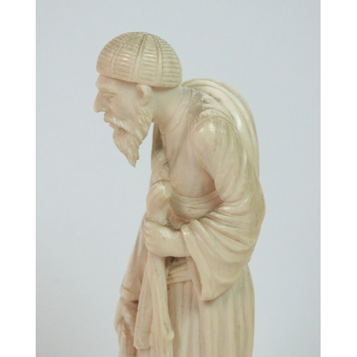 329 - A Continental ivory figure of an old gentleman