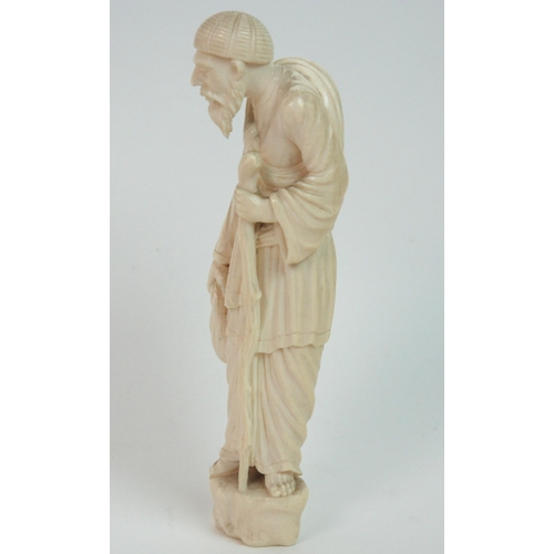 329 - A Continental ivory figure of an old gentleman