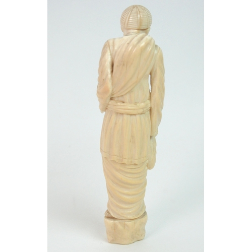 329 - A Continental ivory figure of an old gentleman