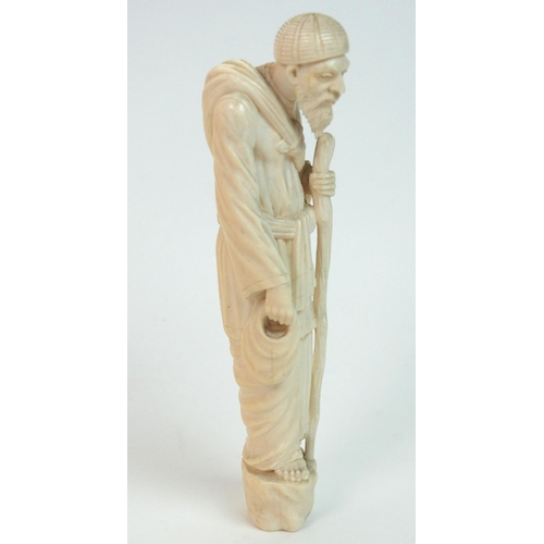 329 - A Continental ivory figure of an old gentleman