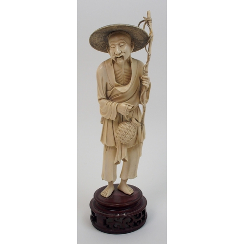 7 - A Chinese ivory model of a fisherman