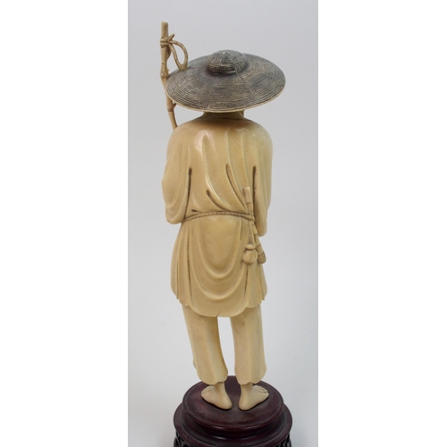 7 - A Chinese ivory model of a fisherman