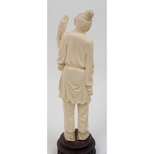 7 - A Chinese ivory model of a fisherman