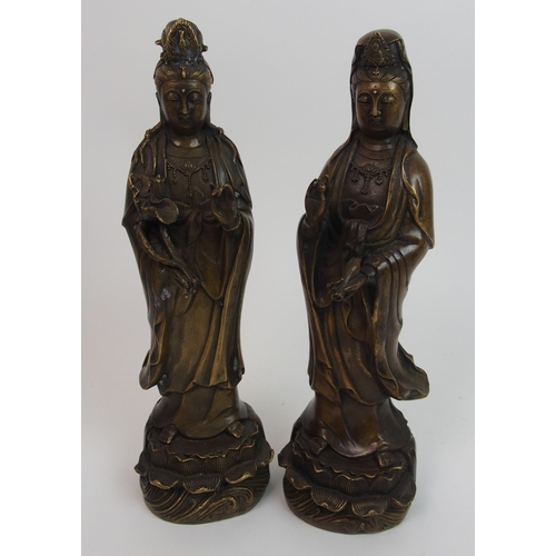 71 - A pair of Chinese bronze models of Guanyin