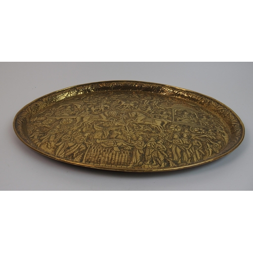 77 - An Indian brass oval tray