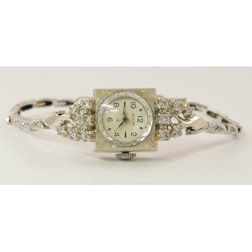 777 - A ladies Elgin 14ct gold diamond set watch