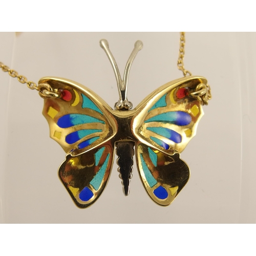 792C - An 18ct plique a jour and champleve butterfly pendant in yellow and white gold