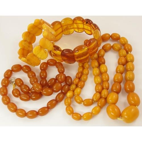 793 - A collection of amber coloured beads and bracelets