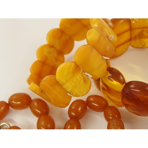 793 - A collection of amber coloured beads and bracelets