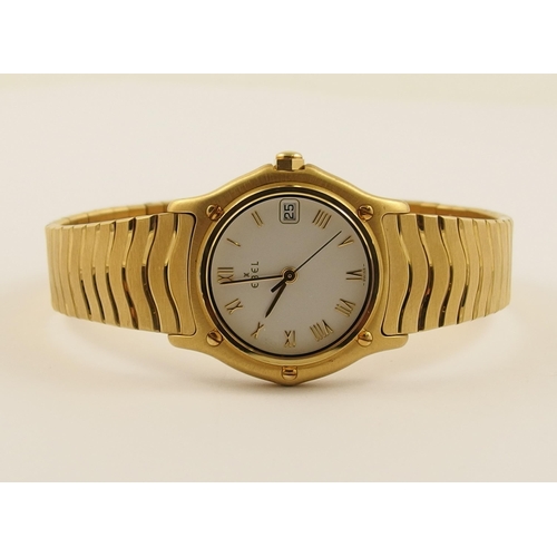 794 - A boxed ladies 18ct gold Ebel Classic wave watch