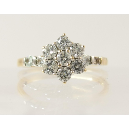 795C - A 14ct gold diamond flower ring of approximately 0.85cts