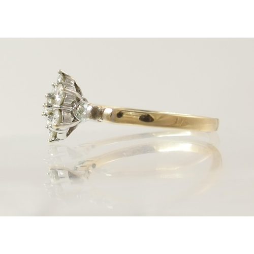 795C - A 14ct gold diamond flower ring of approximately 0.85cts