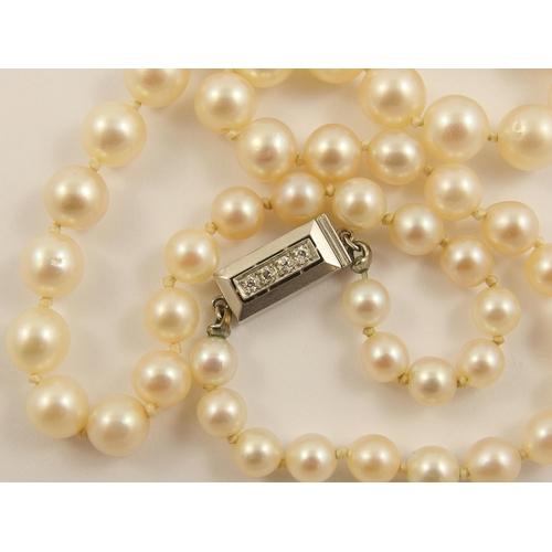 797A - A string of pearls with a diamond set clasp