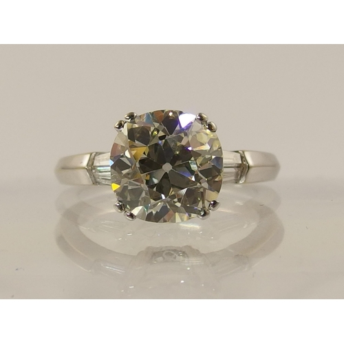 798B - A substantial cushion shaped old cut diamond ring