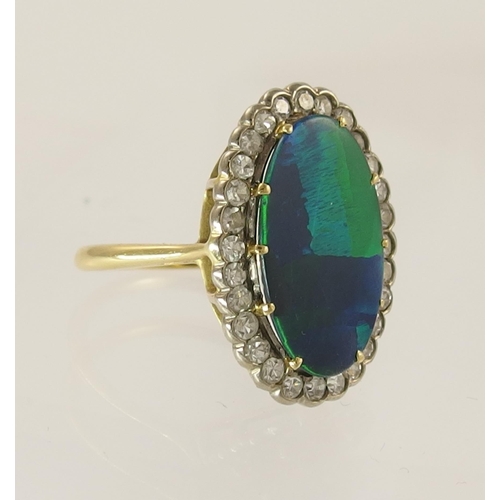 799 - An opal doublet and diamond ring