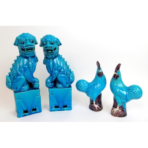 80 - A pair of Chinese blue glazed models of Kylin