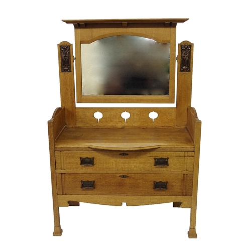 804 - An Arts and Crafts oak dressing table