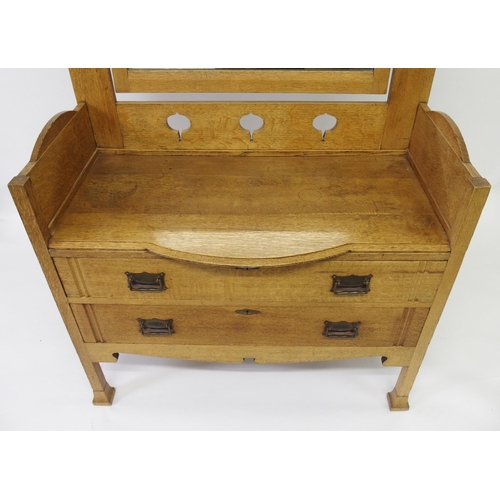 804 - An Arts and Crafts oak dressing table