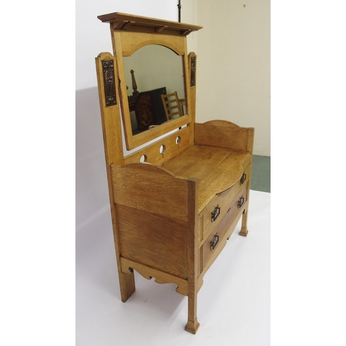 804 - An Arts and Crafts oak dressing table