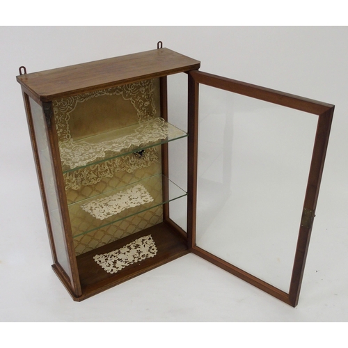 807 - A satinwood crossbanded hanging display cabinet