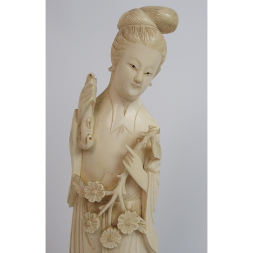 82 - A Chinese ivory figure of a lady