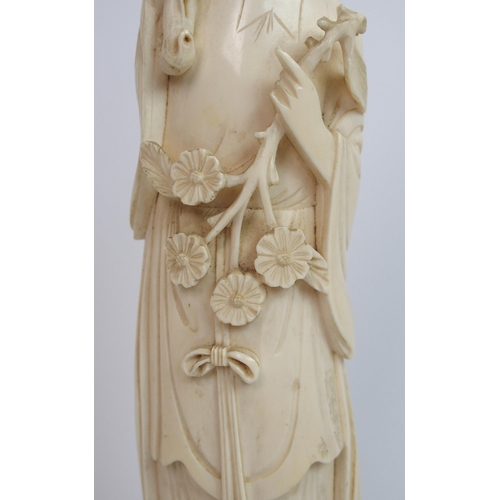 82 - A Chinese ivory figure of a lady