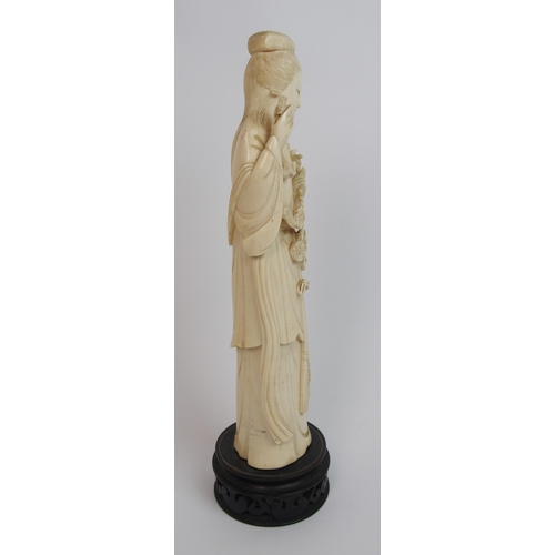 82 - A Chinese ivory figure of a lady