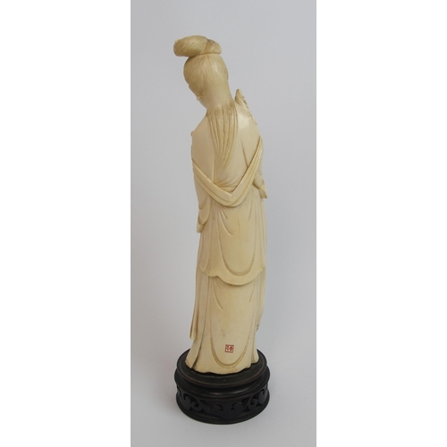 82 - A Chinese ivory figure of a lady