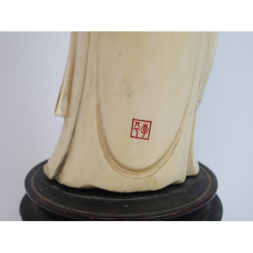 82 - A Chinese ivory figure of a lady